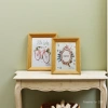 Creative and practical PVC3.5× 5-inch imitation wood photo frame, exquisite candy-colored home picture frame, photography children's photo frame stand customization 091645762 Application Scenario